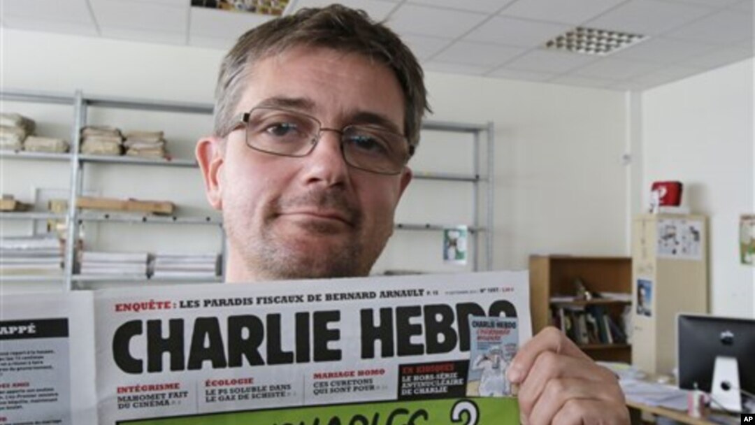 Majalah mingguan satiris Prancis Charlie Hebdo dalam penerbitannya hari Rabu (19 September 2012) memuat karikatur-karikatur tentang Nabi Muhammad (foto, 19/9/2012)., 