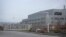 FILE - An SAIC Volkswagen plant is seen in the outskirts of Urumqi in northwestern China's Xinjiang Uyghur Autonomous Region, April 22, 2021. The European Union has moved closer to banning products made from forced labor.