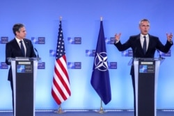 U.S. Secretary of State Antony Blinken, left, and NATO Secretary General Jens Stoltenberg attend a news conference at a NATO Foreign Ministers' meeting at the Alliance's headquarters in Brussels, Belgium, March 23, 2021.