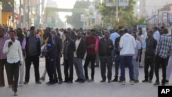 People queue to cast their votes during the 2024 Somaliland presidential election at a polling station in Hargeisa, Somaliland, Nov. 13, 2024.