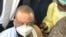 Phó Tổng thống Zimbabwe Constantino Chiwenga được tiêm vaccine Covid-19 Sinopharm của Trung Quốc.