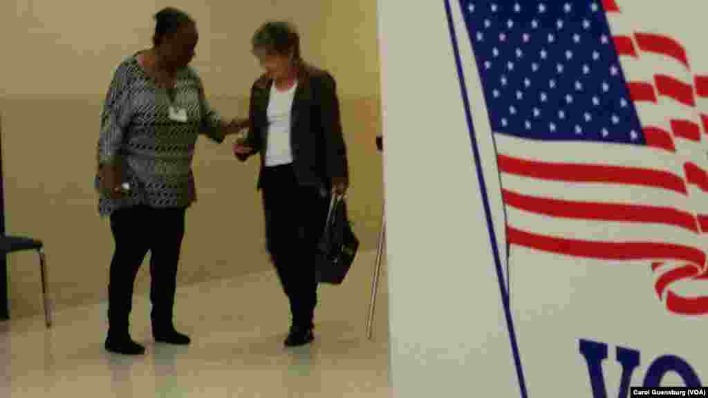 Polling station manager Barbara Heyward, left, congratulates Elisa Tunno for casting a vote in the Republican primary in Charleston, S.C., Feb. 20, 2016. Tunno voted for Marco Rubio after she "changed my mind two or three times."