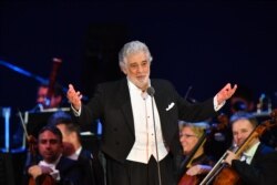 FILE - Spanish tenor Placido Domingo performs during his concert in Szeged, southern Hungary, Aug. 28, 2019.