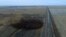 This aerial photo shows spills from TransCanada Corp.'s Keystone pipeline, Nov. 17, 2017, that leaked an estimated 210,000 gallons of oil onto agricultural land in northeastern South Dakota, near Amherst, South Dakota.