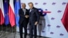 Poland's Prime Minister, Donald Tusk, right, welcomes EU Council President Antonio Costa to a gala event celebrating Poland's assumption of the EU Presidency, in Warsaw, Poland, Jan. 3, 2025.