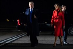 President Donald and first lady Melania Trump arrive at London Stansted Airport to attend the NATO summit, Dec. 2, 2019, in London.