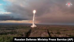 FILE - In this photo taken from video distributed by Russian Defense Ministry Press Service on Oct. 29, 2024, a Yars intercontinental ballistic missile is test-fired from the Plesetsk launchpad in northwestern Russia. 