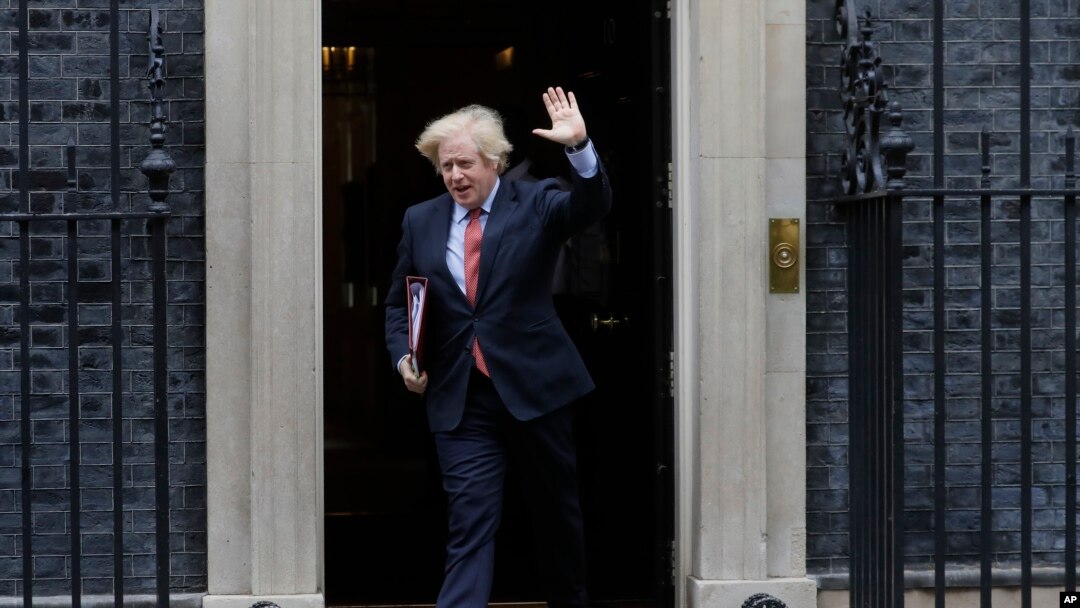 Britain's Prime Minister Boris Johnson leaves 10 Downing Street to attend the weekly session of PMQs in Parliament in London, June 10, 2020.