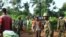 In this photo taken Friday, Oct 5, 2018, Congolese Soldiers patrol in an area civilians were killed by The Allied Democratic Forces rebels in Beni, Eastern Congo. 