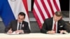  Paraguay Foreign Minister Rubén Ramírez Lezcano and U.S. Deputy Secretary of State Christopher Landau sign agreements during Deputy Secretary Landau's recent visit to the region. 