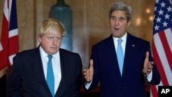 U.S. Secretary of State John Kerry (R) and British Foreign Secretary Boris Johnson give a joint press conference after a meeting on the situation in Syria at Lancaster House in London Oct. 16, 2016.