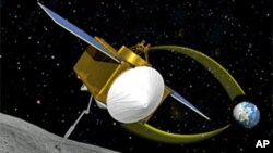 An artist's conception of the OSIRIS-REx spacecraft collecting a sample from asteroid 1999 RQ36 (aka: Bennu)