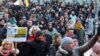 Protesters march during a demonstration against government measures to curb the spread of the coronavirus disease (COVID-19) in Magdeburg, Germany, January. 8, 2022.