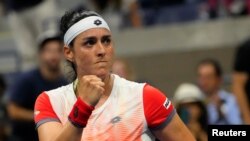 FILE - Ons Jabeur of Tunisia celebrates match point against Ajla Tomljanovic of Australia on day nine of the 2022 U.S. Open tennis tournament at USTA Billie Jean King National Tennis Center. Sept 6, 2022.