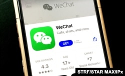 Photo by: STRF/STAR MAX/IPx 2020 9/20/20 A federal judge has temporarily blocked President Trump's executive order banning WeChat downloads in the U.S.. STAR MAX File Photo: 9/18/20 WeChat Logos seen on an iphone 6s.