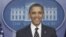 President Barack Obama smiles as he speaks in the James Brady Press Briefing Room of the White House in Washington, February 5, 2013.