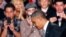 Presiden Barack Obama di Fort Myers, Florida setelah memberikan pernyataan singkat mengenai insiden penembakan di Aurora, Colorado, Jumat (20/7). 