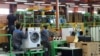 یک کارخانه تولید ماشین لباس‌شویی در ایران