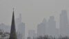 FILE PHOTO: City of London financial district is seen from Primrose Hill as high air pollution obscures the skyline over London