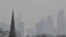 FILE PHOTO: City of London financial district is seen from Primrose Hill as high air pollution obscures the skyline over London