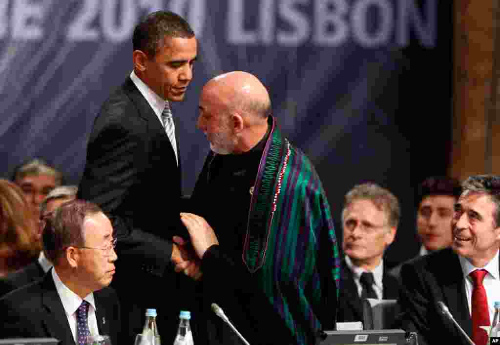 November 2010 -- At a NATO summit in Lisbon, NATO and Afghanistan sign an agreement marking the Atlantic alliance's commitment to the war-torn nation after it ends combat operations, ostensibly by the end of 2014.