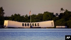 The USS Arizona Memorial is seen before a ceremony to mark the 83rd anniversary of the Japanese attack on Pearl Harbor, Dec. 7, 2024, in Honolulu.