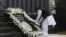 Maharashtra's Chief Minister Prithviraj Chavan places a wreath as he pays tribute at the Gymkhana police memorial marking the November 2008 Mumbai attacks, in Mumbai, Nov. 26, 2013. 