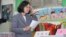 Taiwanese President Tsai Ing-wen waits to cast her ballot, Nov. 24, 2018, in Taipei, Taiwan. Taiwanese began voting in midterm local elections Saturday seen as a referendum on Tsai's independence-leaning administration, amid growing pressure from China.
