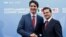 FILE - Canada's Prime Minister Justin Trudeau (left) greets Mexico's President Enrique Pena Nieto as he arrives for the North American Leaders' Summit in Ottawa, Ontario, Canada, June 29, 2016. 