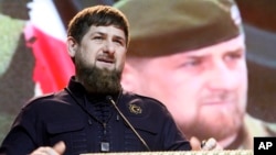 FILE - Chechen leader Ramzan Kadyrov speaks at a Defenders of the Fatherland Day celebration in the provincial capital of Grozny, Russia, Feb. 20, 2016. He's been nominated for another term, despite criminal allegations.