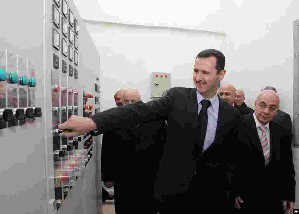 President Bashar al-Assad inaugurates a Euphrates River water project near Aleppo in January, 2008. Scientists claim Syria’s president mismanaged national water policy that lead to civil unrest.