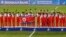 1일 인천 아시안게임 여자 축구 결승전에서 일본을 꺽고 금메달을 차지한 북한 선수팀이 시상식에서 손을 흔들고 있다.