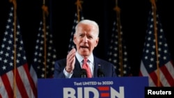 FILE - Democratic U.S. presidential candidate Joe Biden speaks in Wilmington, Del., March 12, 2020.