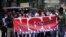 Members and supporters of the Ivorian Popular Front (FPI) party protest against President Alassane Ouattara's new constitution, in Abidjan, Ivory Coast, Oct. 8, 2016. The banner reads, "No to Ouattara constitution." 