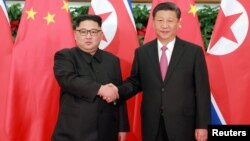 Ким Чен Ын и Си Цзиньпин