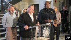Little Rock Mayor Mark Stodola speaks at a news conference next to Police Chief Kenton Buckner in Little Rock, Ark., July 1, 2017, about an early morning shooting at a nightclub that left at least 28 people injured.