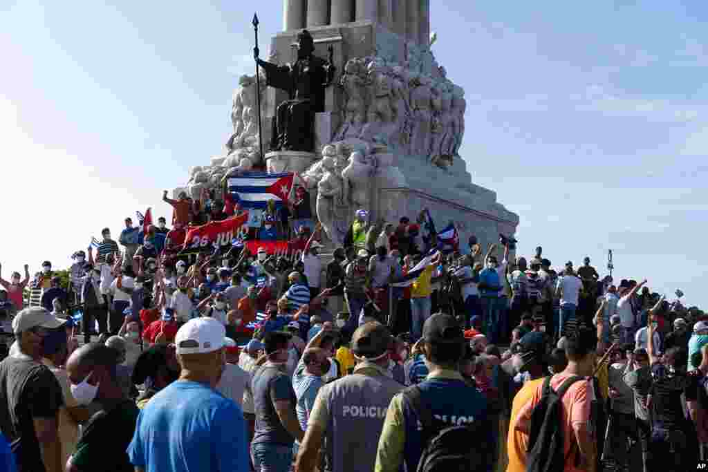 Anti-government protesters gather at the Maximo Gomez monument in Havana, Cuba, July 11, 2021. 