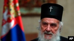 FILE - Serbian Patriarch Irinej is pictured in Belgrade, March 15, 2020. The patriarch of the Serbian Orthodox Church has been hospitalized after testing positive for the new coronavirus. 