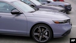 FILE - Honda sedans sit in Salem, N.H., March 13, 2023. The U.S. has announced a 25% tariff on vehicle imports, starting in April. Though the policy targets cars entering the U.S., it could impact Nigeria's auto market, which depends on American used car exports. 