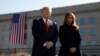 U.S. President Donald Trump and first lady Melania Trump participate in a 9/11 observance at the National 9/11 Pentagon Memorial in Arlington, Virginia, Sept. 11, 2017.