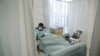 A patient being treated at a makeshift hospital run by charity organisation The Gift of the Givers, during the coronavirus disease (COVID-19) outbreak in Johannesburg, South Africa, July 10, 2021.