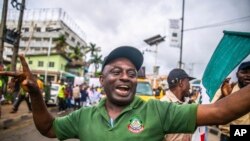 FILE - Labour unionists march in the streets of Lagos, Nigeria, Wednesday, Aug. 2, 2023, to protest the soaring cost of living under the West African nation's new president, with calls for the government to improve social welfare interventions to reduce hardship.