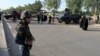 FILE - A member of Iraqi security forces stands guard in Baghdad's Kadhimiya district, May 2, 2016. Fearing a repeat of last week's turmoil when protesters stormed into the fortified Green (International) Zone, Baghdad was on lockdown Friday. 