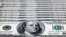 FILE - US $100 notes