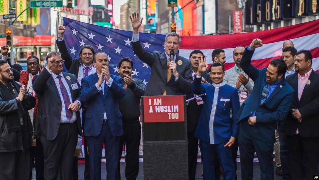 New York City Mayor Bill de Blasio speaks during a rally in support of Muslim Americans and protest of President Donald Trump's immigration policies in Times Square, New York, Sunday, Feb. 19, 2017.