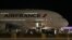 FILE - Workers load cargo on an Air France Airbus 380 at Salt Lake City International Airport, Nov. 17, 2015.