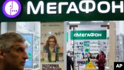 People inside a Megafon mobile phones shop in Moscow, Russia, May 13, 2017. A top Russian mobile operator said Friday it had come under cyberattacks that appeared similar to those that have crippled some U.K. hospitals