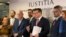 Judges of the Iustitia association release a report listing dozens of judges and prosecutors who are facing reprisals for questioning changes the right-wing government is making to the court system, in Warsaw, Poland, Feb. 29, 2020.