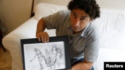 Exiled Syrian artist Najah al-Bukai poses with a ball-pen drawing that stems from the haunting memories of the torture Bukai says he went through and witnessed when imprisoned twice in Syrian government jails, in Yerres, near Paris, Sept. 13, 2018. 