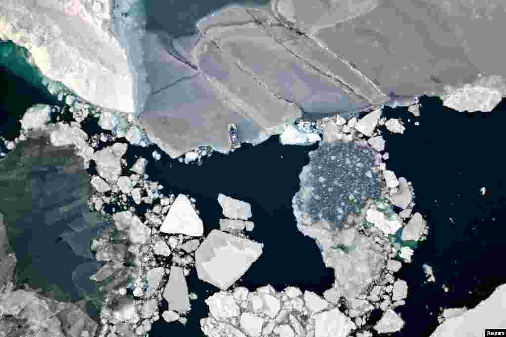 An aerial view shows ice floating in front of Sermitsiaq Island near Nuuk, Greenland, Feb. 9, 2025. 